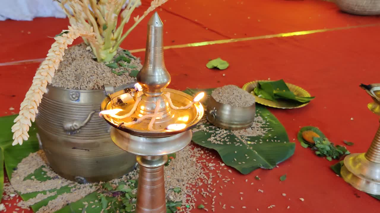 closeup view of lamp flames in a decorated stage