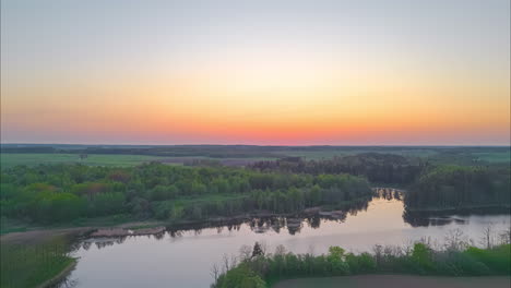 Exploring-a-historic-lake-with-an-antique-settlement,-aerial-landscape-view