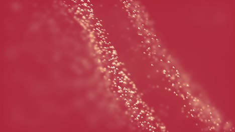 abstract particle stream on red background