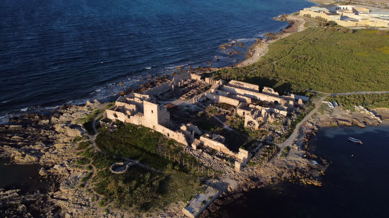 View of Tuna fishery of San Giuliano at sunset, Trapani, Sicily, Italy. Aerial, high angle