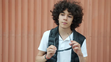 teenage boy with sunglasses