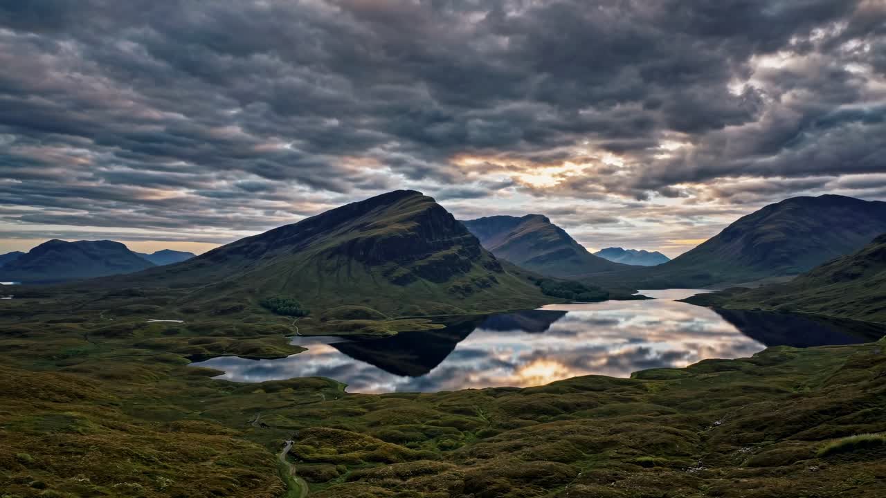 Dramatic landscape video with a low-angle view of a lush valley, emphasizing depth and texture