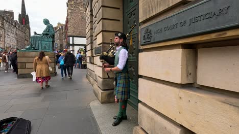 bagpiper performing outside the high court