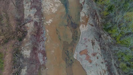 Birds-Eye-Aerial-over-Cedar-Creek-in-Monterey-Kentucky-beautiful-fall-footage-at-sunset