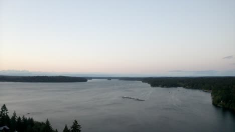 Aerial-of-the-puget-sound-at-sunset,-PNW-sunset-ocean-drone