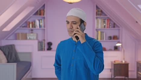 Muslim-man-talking-on-phone