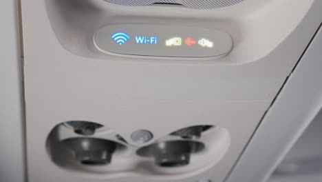 individual passenger panel on the plane with the wi-fi logo