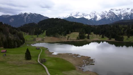 Aerial-view-of-mountain-lake-Geroldsee-in-Bavarian-Alps