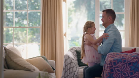 little-girl-jumping-into-fathers-arms-happy-dad-catching-his-daughter-enjoying-playful-game-at-home-family-trust-4k