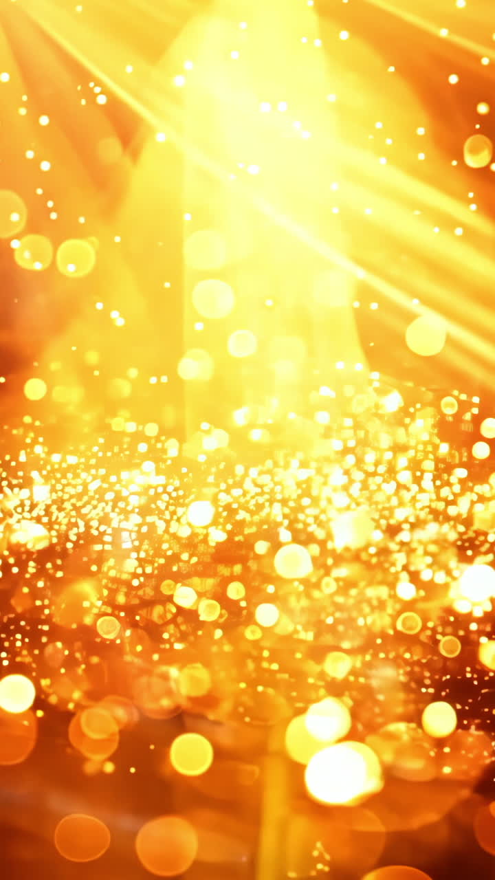 A bright orange background with a lot of glitter. The glitter is scattered all over the background, creating a sense of movement and energy