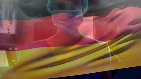 Animation-of-waving-germany-flag-against-portrait-of-caucasian-female-surgeon-at-hospital