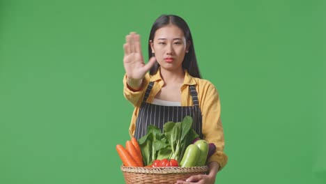 woman refusing vegetables