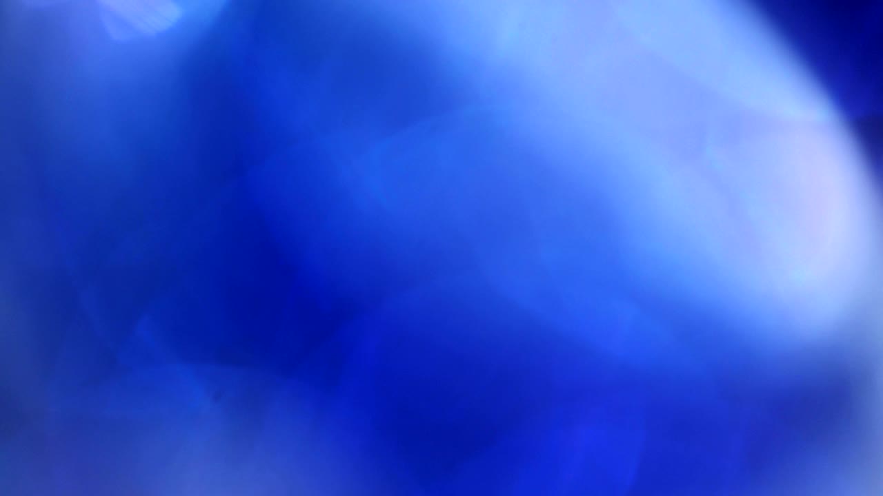 partículas de chispas abstractas que se mueven pequeñas grandes desenfocadas