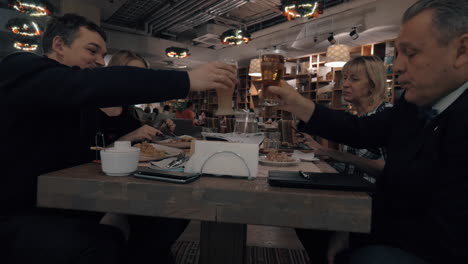 family members having meals and drinks in the restaurant