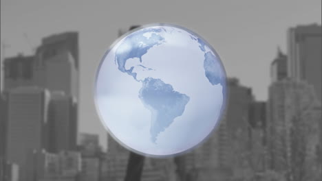 animation of globe over caucasian businessman in city