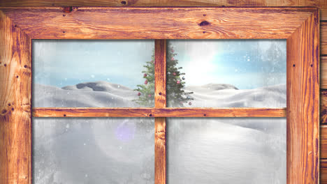 Wooden-window-frame-against-snow-falling-over-christmas-tree-on-winter-landscape