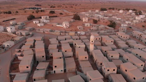 aerial shot of an old empty city in the desert in palestine near gaza at morning