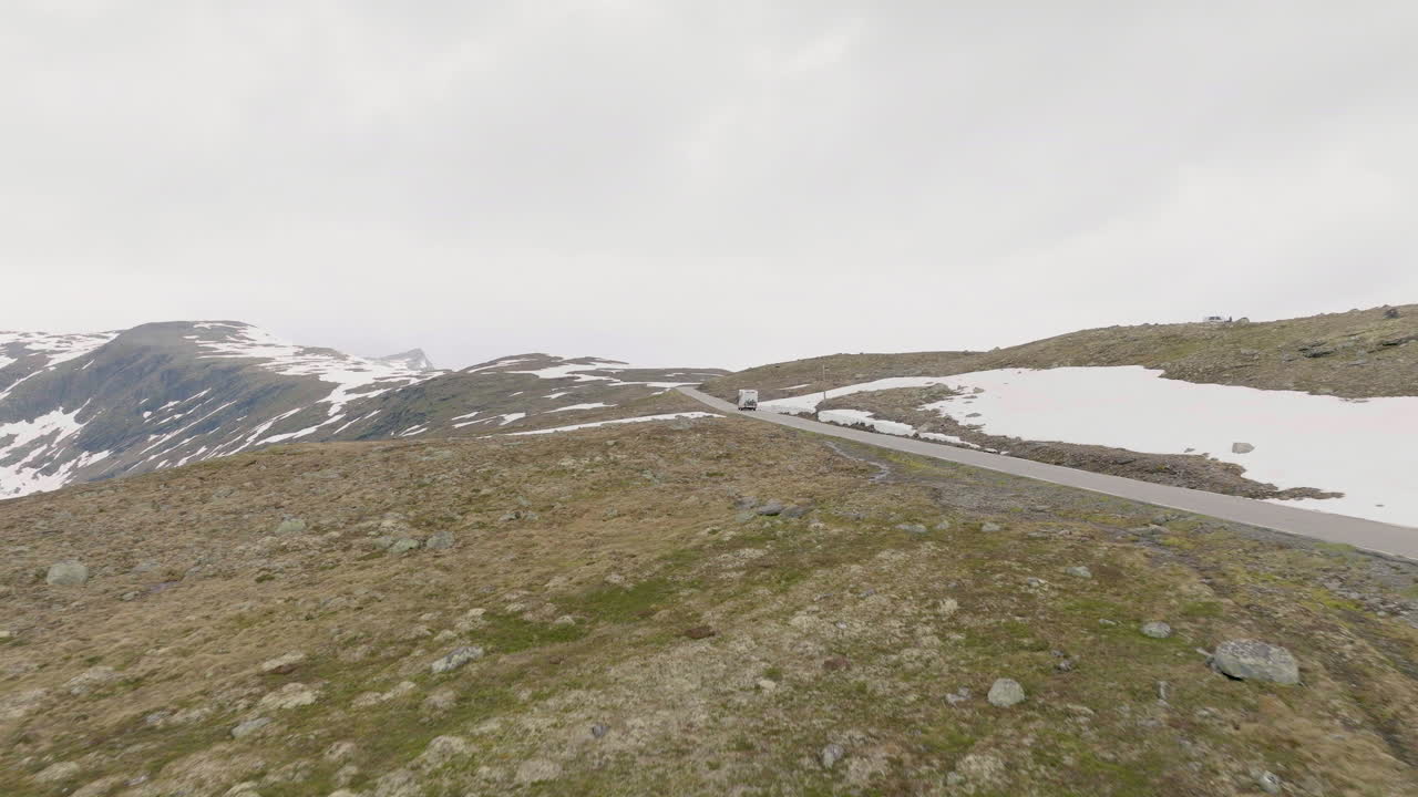Sensational aerial drone view of vast western Norway mountain snowy landscape