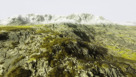 stunning rocky landscape with majestic snow capped mountains in bright light