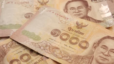 dolly shot of thai banknote