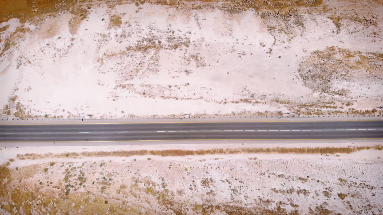 Straight line Highway in the desert aerial view