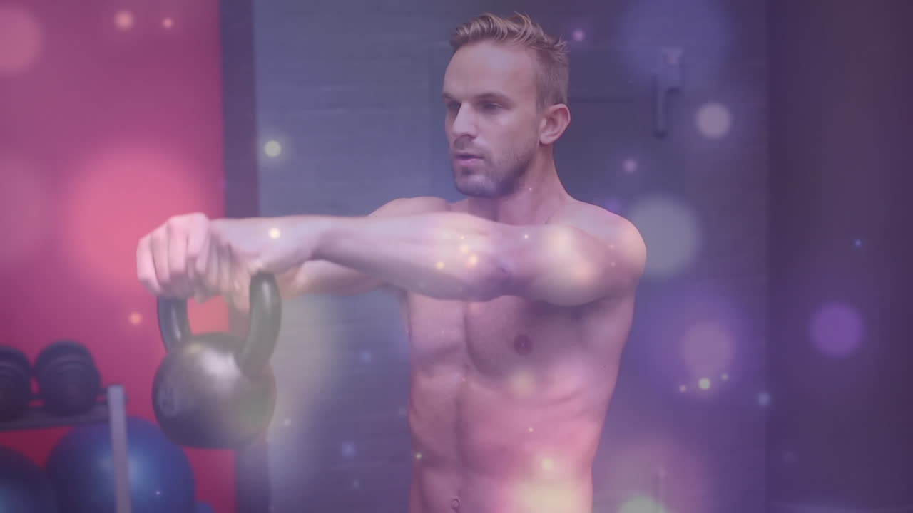 animación de luz brillante sobre un hombre en forma haciendo ejercicio en el gimnasio