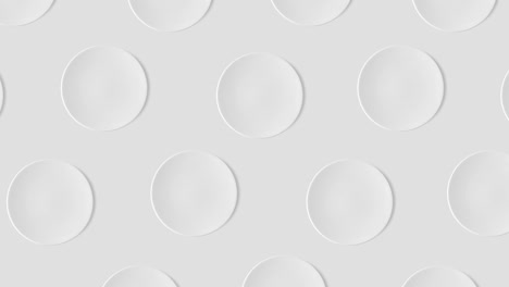 patrón abstracto con muchas placas blancas vacías animadas en un fondo gris, vista superior, espacio de copia. pasteles se mueven en diferentes direcciones, 4k