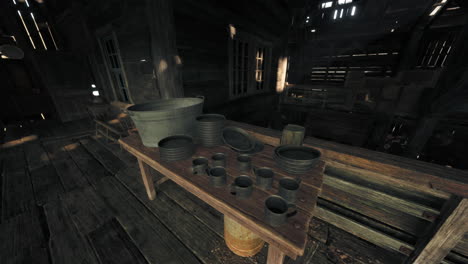 rusty metal dishes and mugs on a wooden table in an old barn