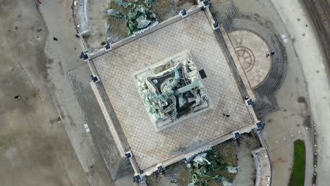 Angel-of-liberty-Girondins-monument-in-Bordeaux-France-with-lower-fountains-seen-from-the-top,-Aerial-top-view-rotation-shot