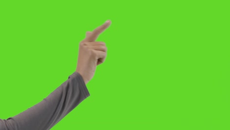 studio close up shot of woman pretending to press buttons against green screen