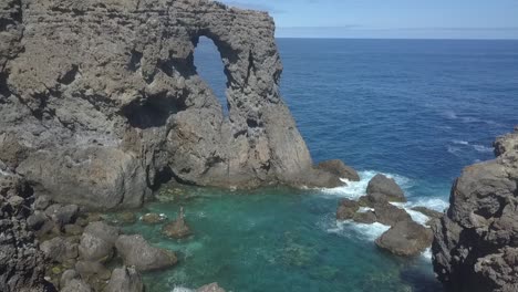 amazing view of rocks near sea on sunny day