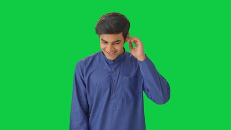 Cute-and-shy-Indian-boy-Green-screen