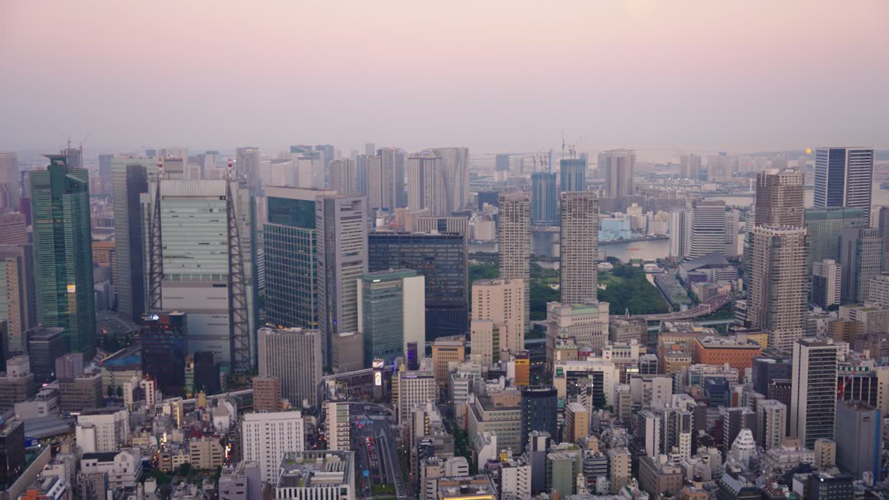 Sunset over Tokyo Skyline, High Rooftop Point of View of Minato and Bay, Japan
