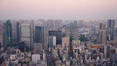 sunset over tokyo skyline, high rooftop point of view of minato and bay, japan
