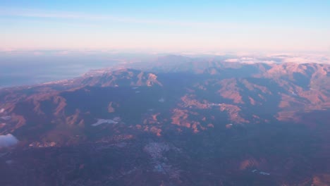 flying over the mountains of malaga, spain