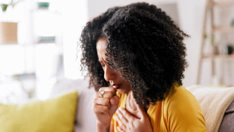 black woman, cough and hand in house on sofa