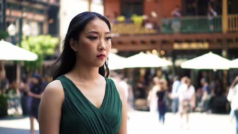 woman in green dress outdoors