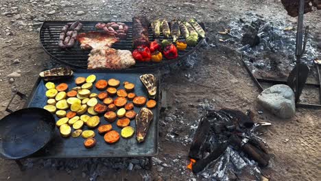 delicious grilled vegetables and meat in argentine grill, south american grilled style