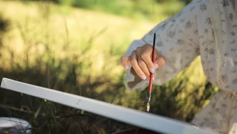 a young woman draws a picture of a pine forest at sunset - a young woman draws a picture of a pine forest at sunset. the artist admires the natural landscape, beautiful trees. leisure concept illustration
