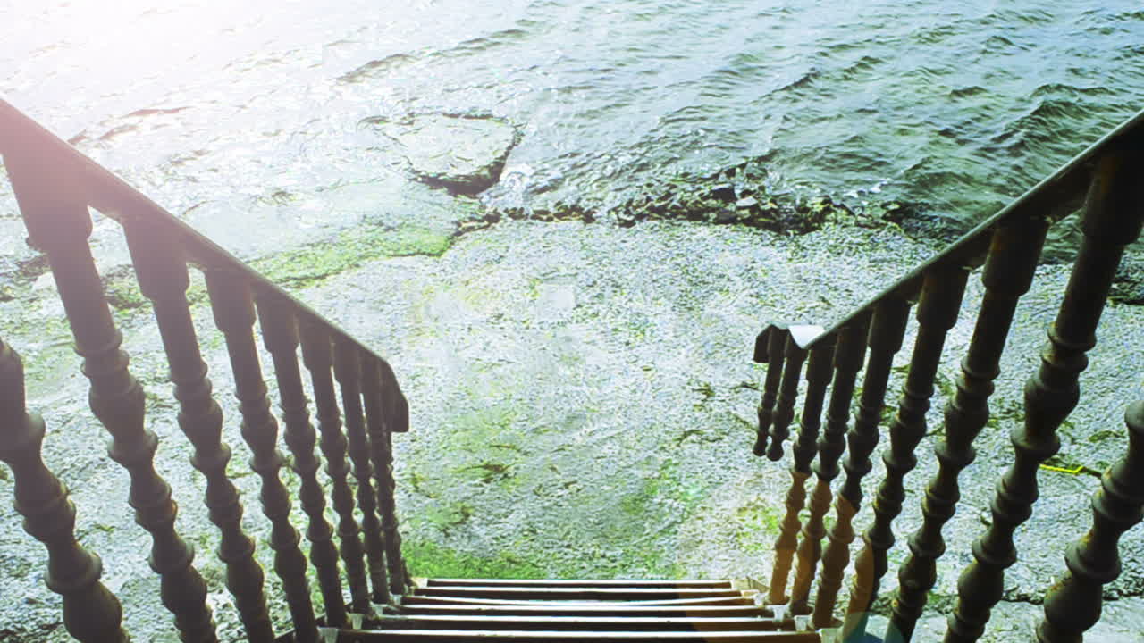 Ladder showing way to the sea. Ladder to the sea