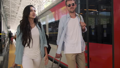 couple traveling by train