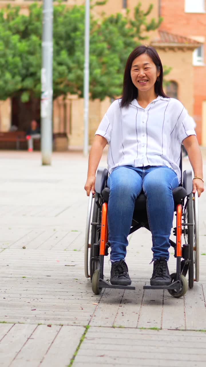 Woman in Wheelchair Interacting Outdoors