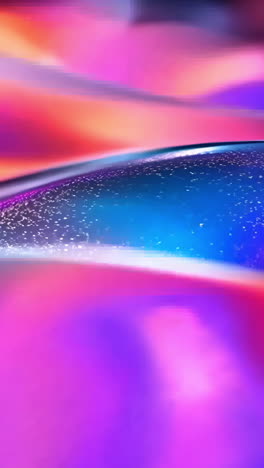 a colorful, abstract painting of a wave with a purple and orange hue. the painting is full of energy and movement, with the colors blending together to create a dynamic and vibrant scene