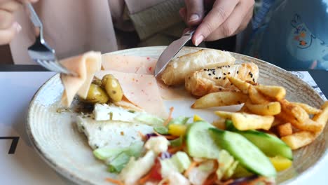 a person eating a delicious breakfast buffet