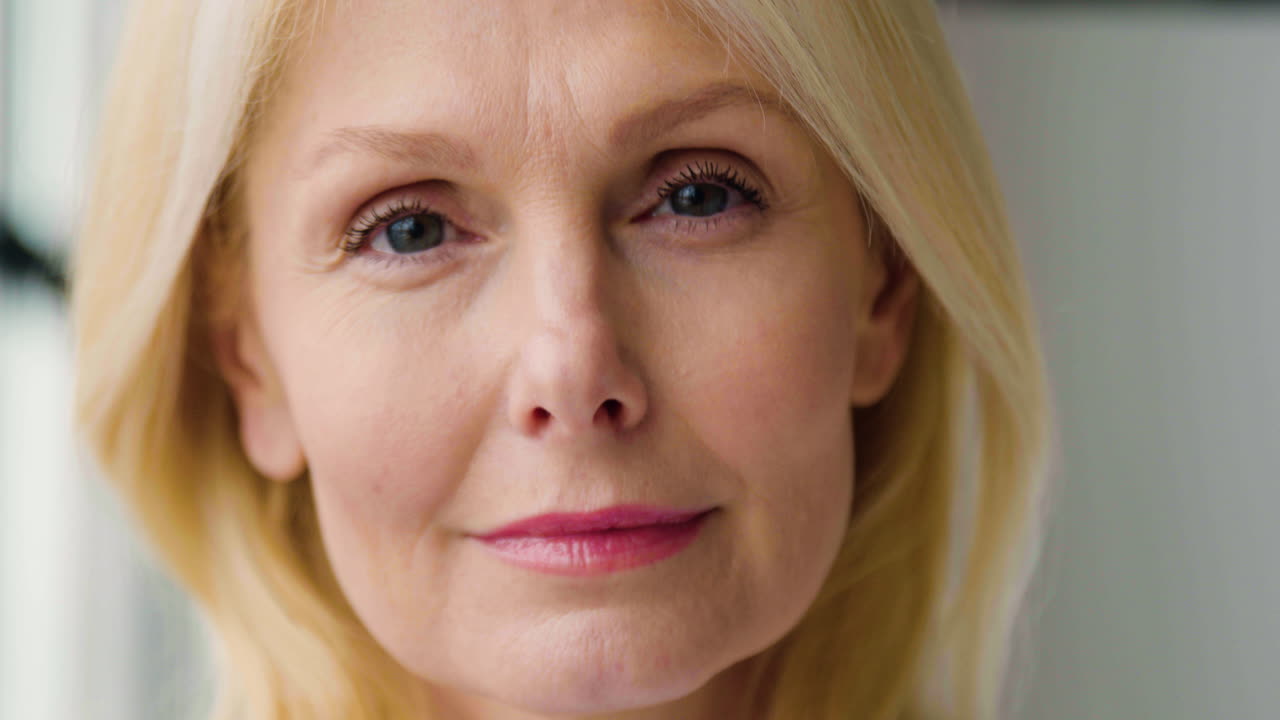 Close up view of blonde woman face