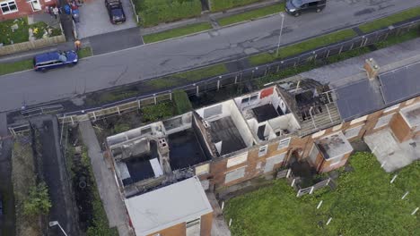 drone shot showing fire damage houses in whitebirk, blackburn lancashire