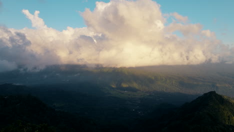 Mount-Agung-Volcano-Top-Shrouded-In-White-Clouds-In-Background,-Northeastern-Bali,-Indonesia