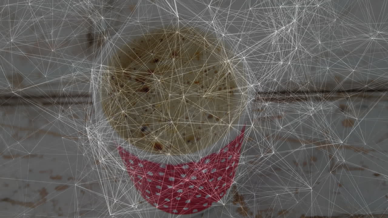 Red polka dot cup sitting on weathered white slats holding noodles, broth in flat design