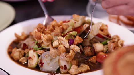 delicious thai dish being prepared and served