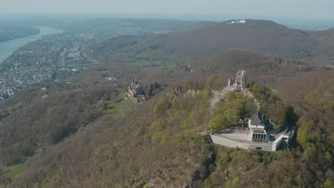 drone - aerial shot of the drachenfels with castle drachenburg and the river rhine siebengebirge near bonn - königswinter 30p